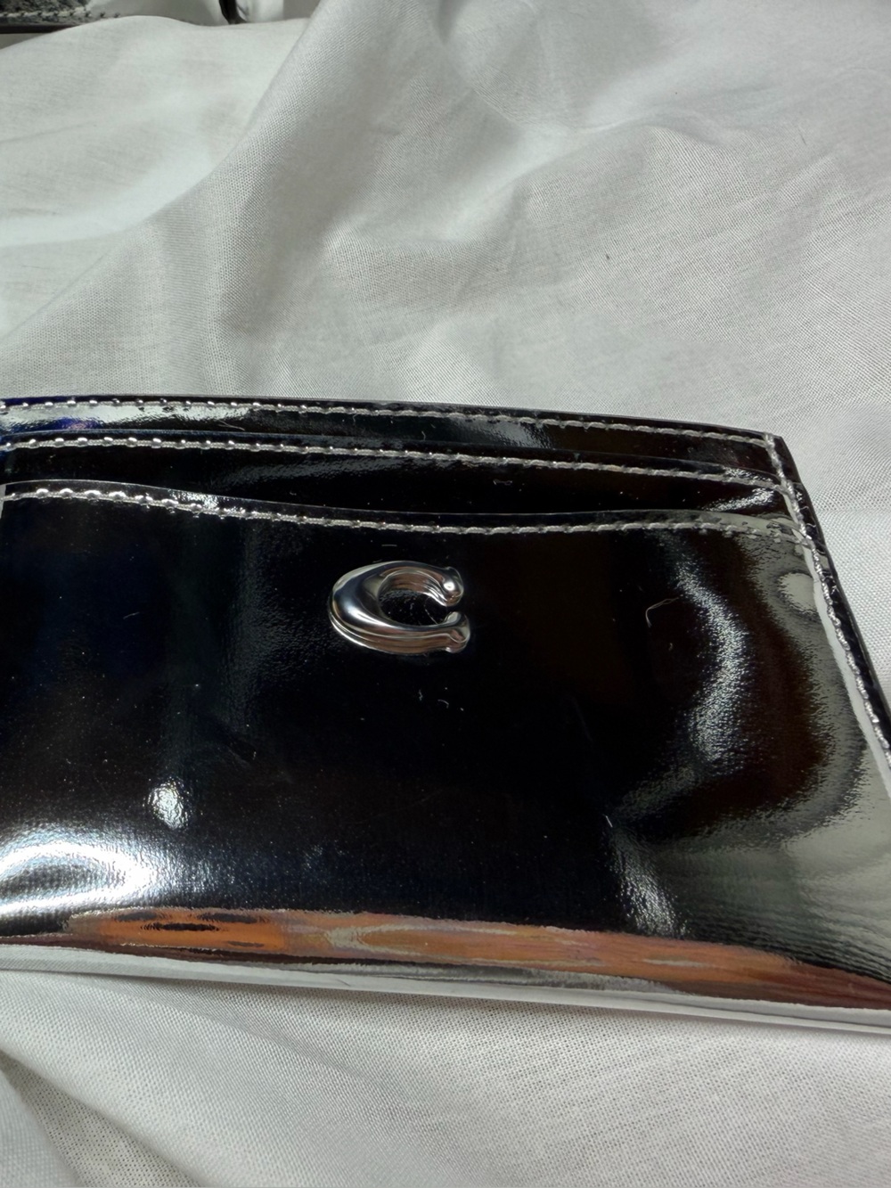 Coach silver metallic card case